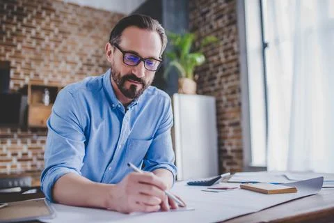 Engineer drawing building plans Stock Photos