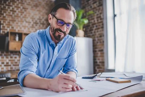 Engineer drawing building plans Stock Photos