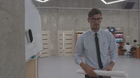 Engineer with a drawing 스톡 동영상 118680600