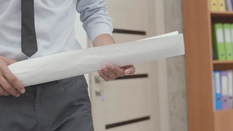 Engineer with a drawing Stock Footage 118680627