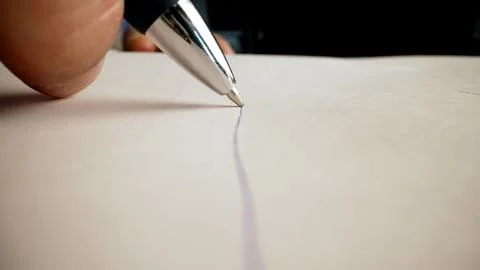 Engineer drawing scheme on paper with a pen Stock Photos