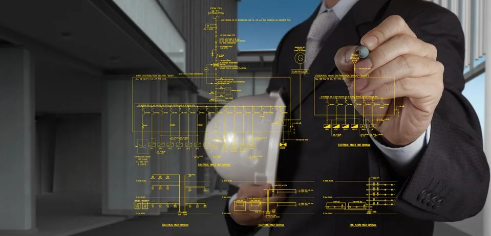 Engineer draws an electronic single line schematic Stock Photos