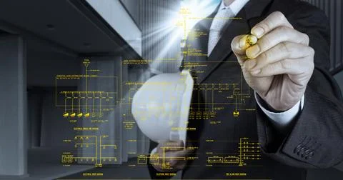 Engineer draws an electronic single line and fire alarm riser schematic Stock Photos