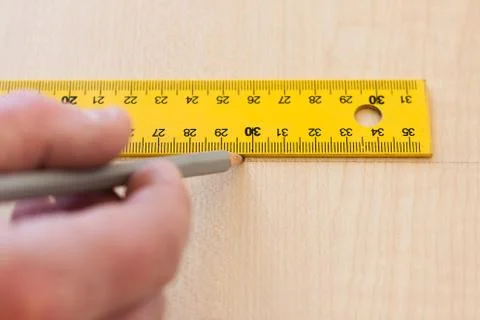 Engineer draws a pencil on a board Stock Photos