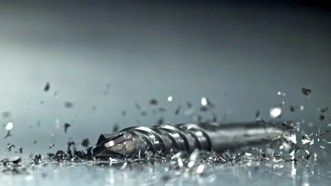 Engineer drill test flute swarf slowmotion study Filmed on a high-speed camera Video stock 335413252