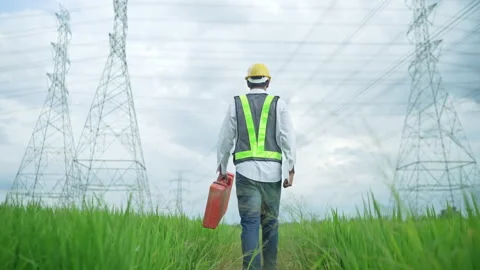 Engineer Electric Carrying toolbox working outside Stock Footage 156711463