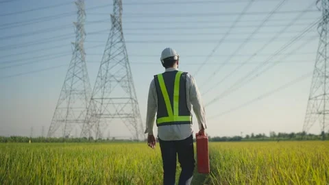 Engineer Electric working outside Stock Footage 148343665