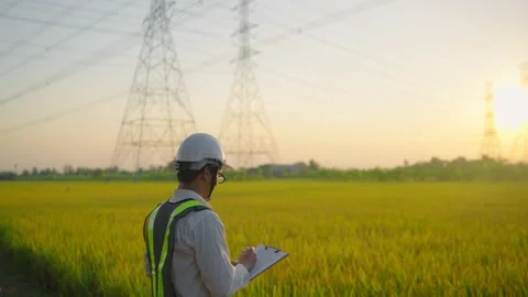 Engineer Electric working outside Stock Footage 148355658