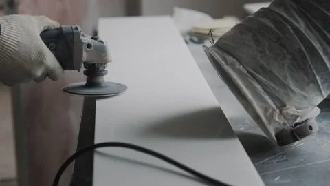 Engineer engraver cleans the surface of the stone slab for further processing, t Stock Footage 99039149