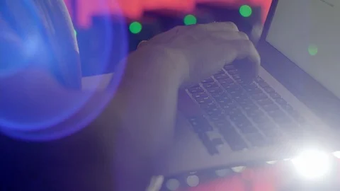 An engineer enters data into a laptop in a mining farm 스톡 동영상 96065248