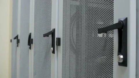 Engineer enters the server room to debug equipment Stock Footage 114501403