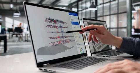 Engineer Examines 3D Digital Twin Mapping With Advanced BIM And GIS Tools For 写真素材