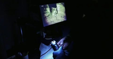 Engineer examines part on computer screen during non-destructive inspection Stockbeeldmateriaal 108774712