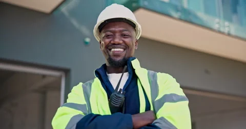 Engineer, face and happy man with arms crossed, construction site and confident Stock Footage 345321337