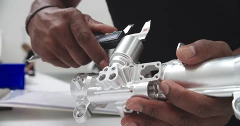 Engineer In Factory Measuring Component With Micrometer 库存影片 56213774