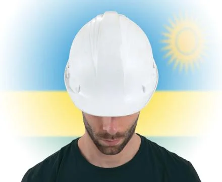 Engineer with flag on background - Rwanda Stock Photos