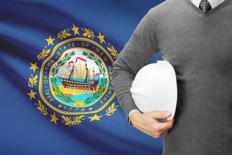 Engineer with flag on background series - new hampshire 写真素材