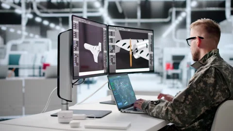 Engineer Focuses On 3D Drone Design Using Laptop Stock Footage 346923012