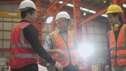Engineer foreman glad hand shake and satisfied with team worker for success Stock Footage 172571734