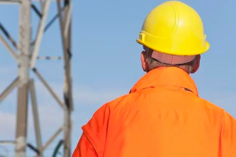 Engineer, foreman or worker with hard hat and protective clothing in front of Free Stock Photos