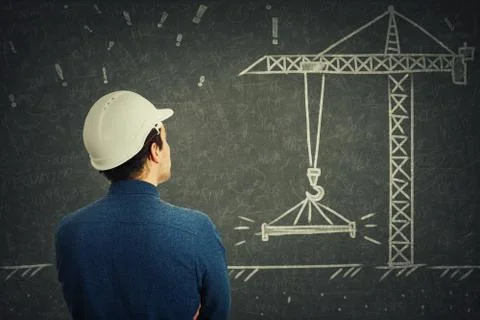 Engineer in front of blackboard Stock Photos