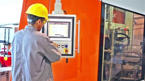 Engineer in the front of the control panel Stock Footage 70155490