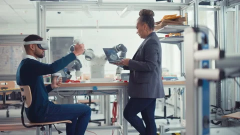 Engineer Givin Advices To Developer In Headset Stock Footage 187564282
