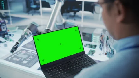 Engineer with Green Screen Laptop Using ... | Stock Video | Pond5