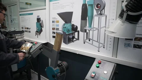 Engineer at a grinding equipment Video stock 99180075