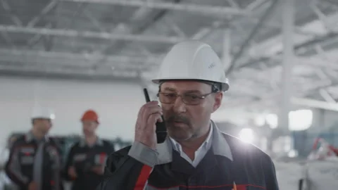 Engineer Group Planning Work of Machinery Manufacture. Male Labor Person in Prot Stock Footage 199475854