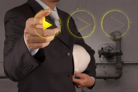 Engineer hand press play button sign to start or initiate projects as concept Stockillustratie