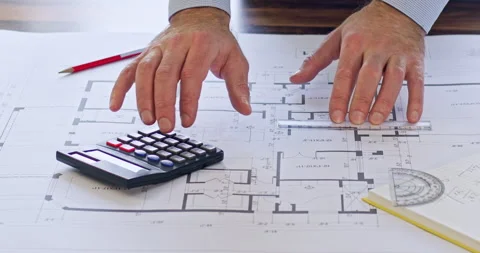 Engineer hands make construction calculations of building 스톡 동영상 243830535