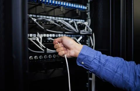 Engineer hands, server room and cable connection for software update or Stock Photos