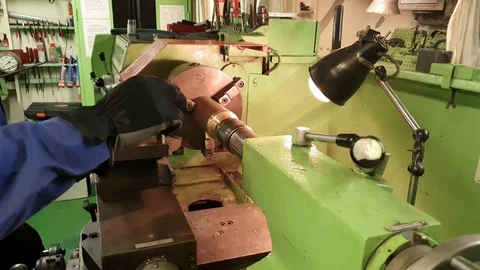 Engineer hands work on lathe on Onyx tanker close side view Stock Footage 121118423