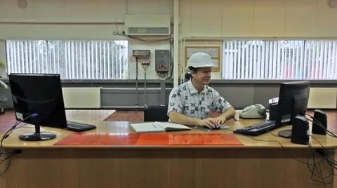 Engineer In Helmet On Computers Stock Footage 8659441