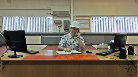 Engineer In Helmet On Phone Video stock 8659455