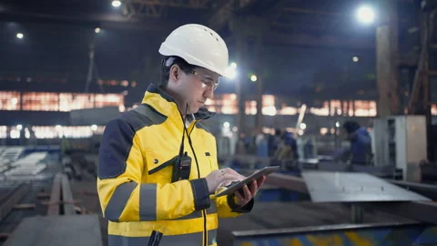 Engineer In Helmets With Tablet Device Stock Footage 237549063