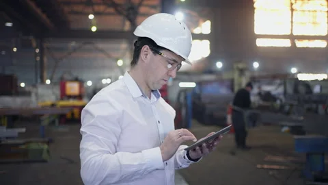 Engineer In Helmets With Tablet Device Stock Footage 237558867