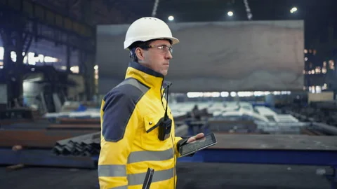 Engineer In Helmets With Tablet Device Stock Footage 240083948