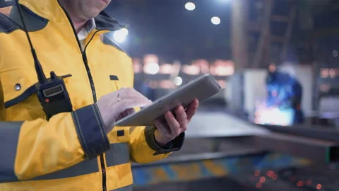 Engineer In Helmets With Tablet Device Stock Footage 240085274