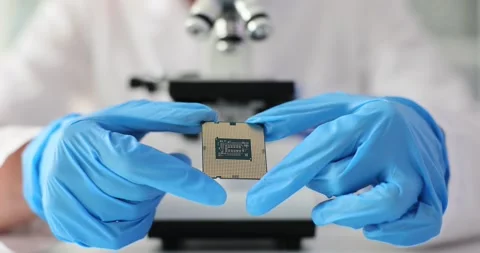 Engineer is holding chip for repair concept Stock Footage 257054670