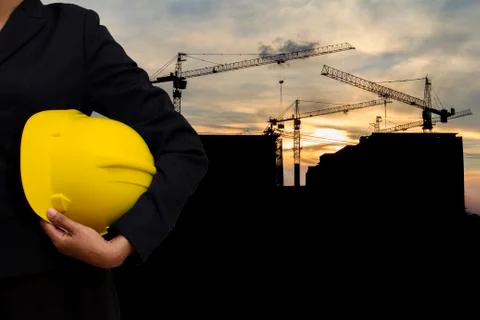 Engineer holding Yellow helmet Stock Photos