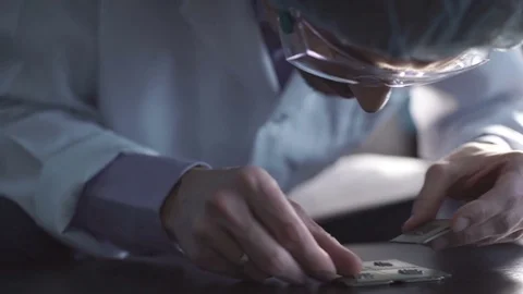 The engineer holds a computer processor Stock Footage 83481632