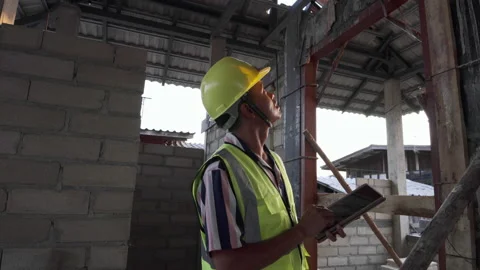 Engineer insoecture in new house construction site building Stock Footage 149915978