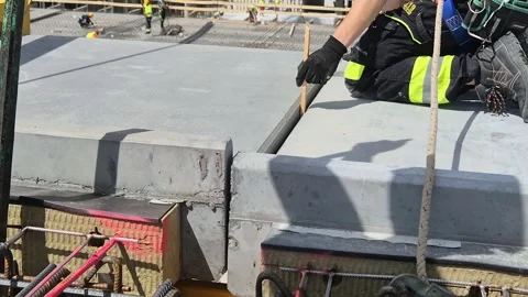 Engineer Inspecting Precast Concrete Balcony Installation Stock Footage 338226977