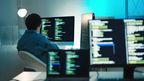 Engineer inspecting programming code for system debugging and development task Stock Footage 313813579