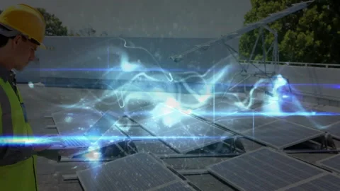 Engineer inspecting solar panels on rooftop, displaying AR holographic data with Video stock 308026202