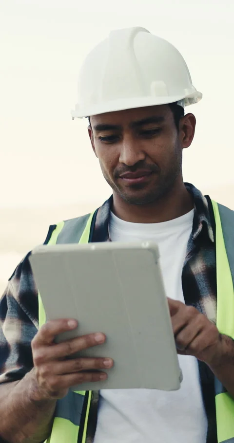 Engineer, inspection and man with tablet, construction and reading research for Stock Footage 345577752