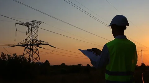 Engineer inspects high-voltage lines. Stock Footage 165159483
