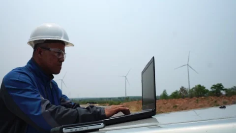 Engineer Inspects Wind Turbines  Stock Footage 127921191